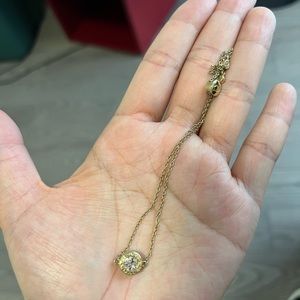 Coach bracelet with pink diamond